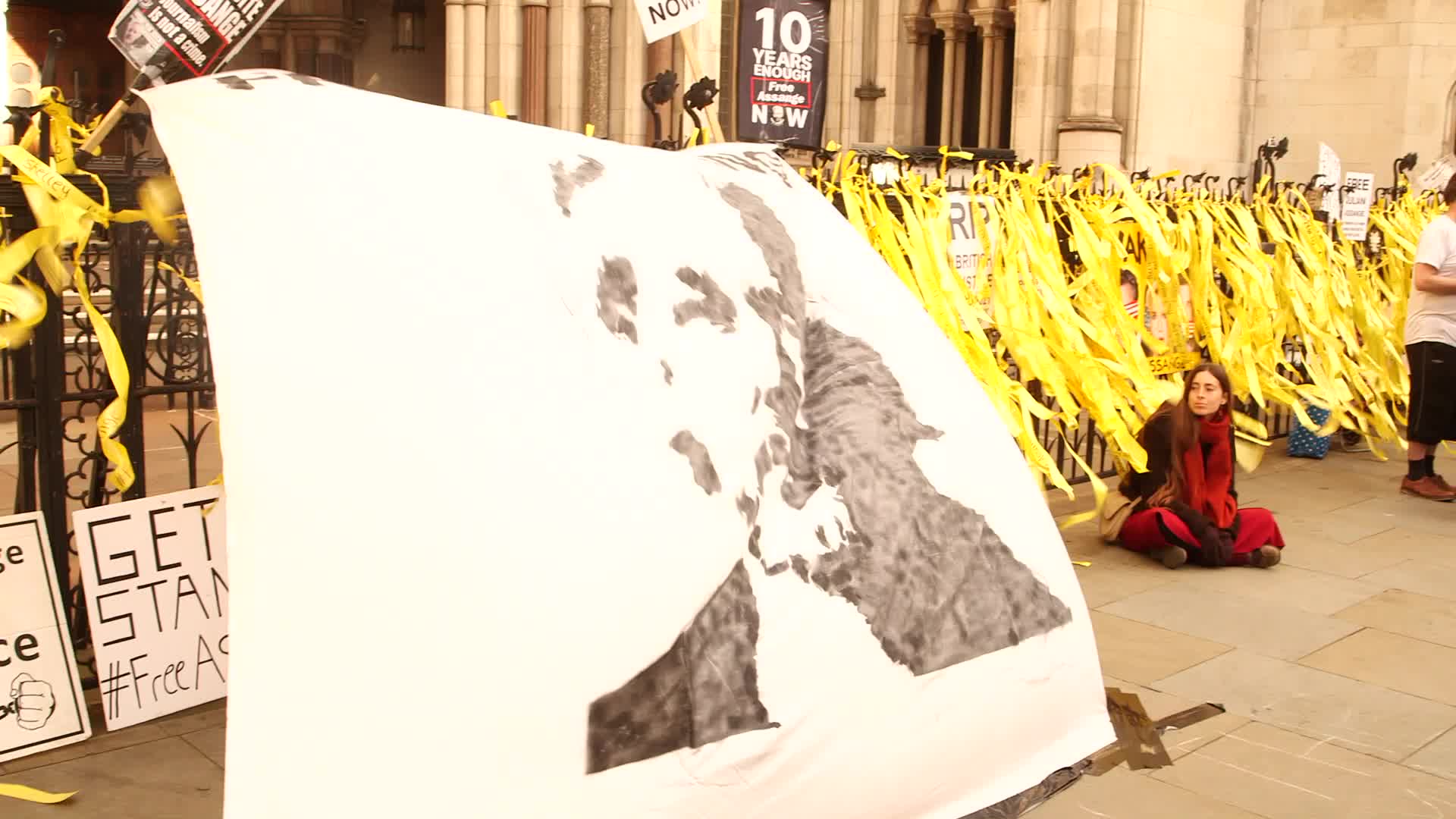 Supporters of Wikileaks founder Julian Assange protest in London