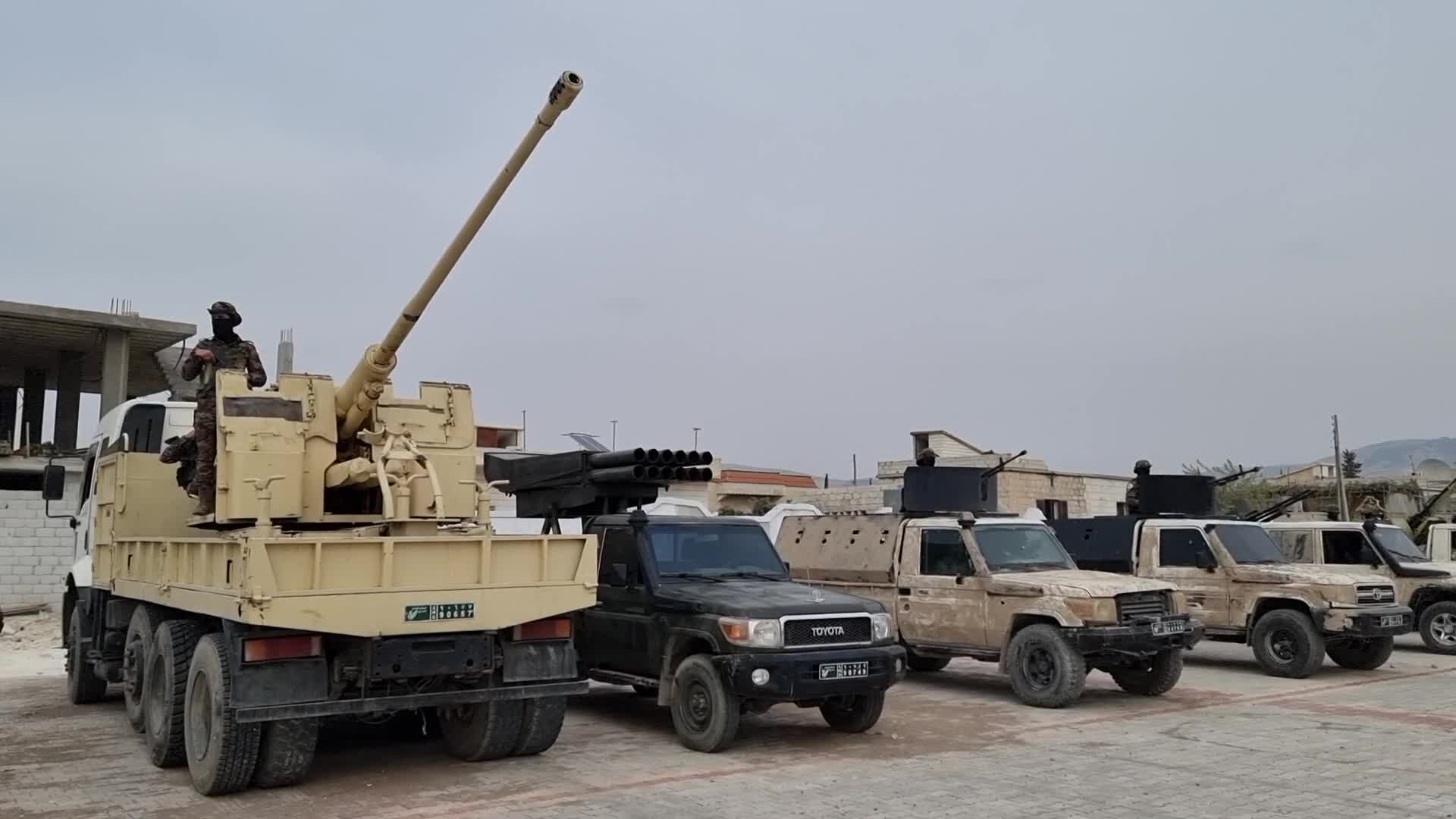 Turkish-backed Syrian rebel fighters take part in a military exercise