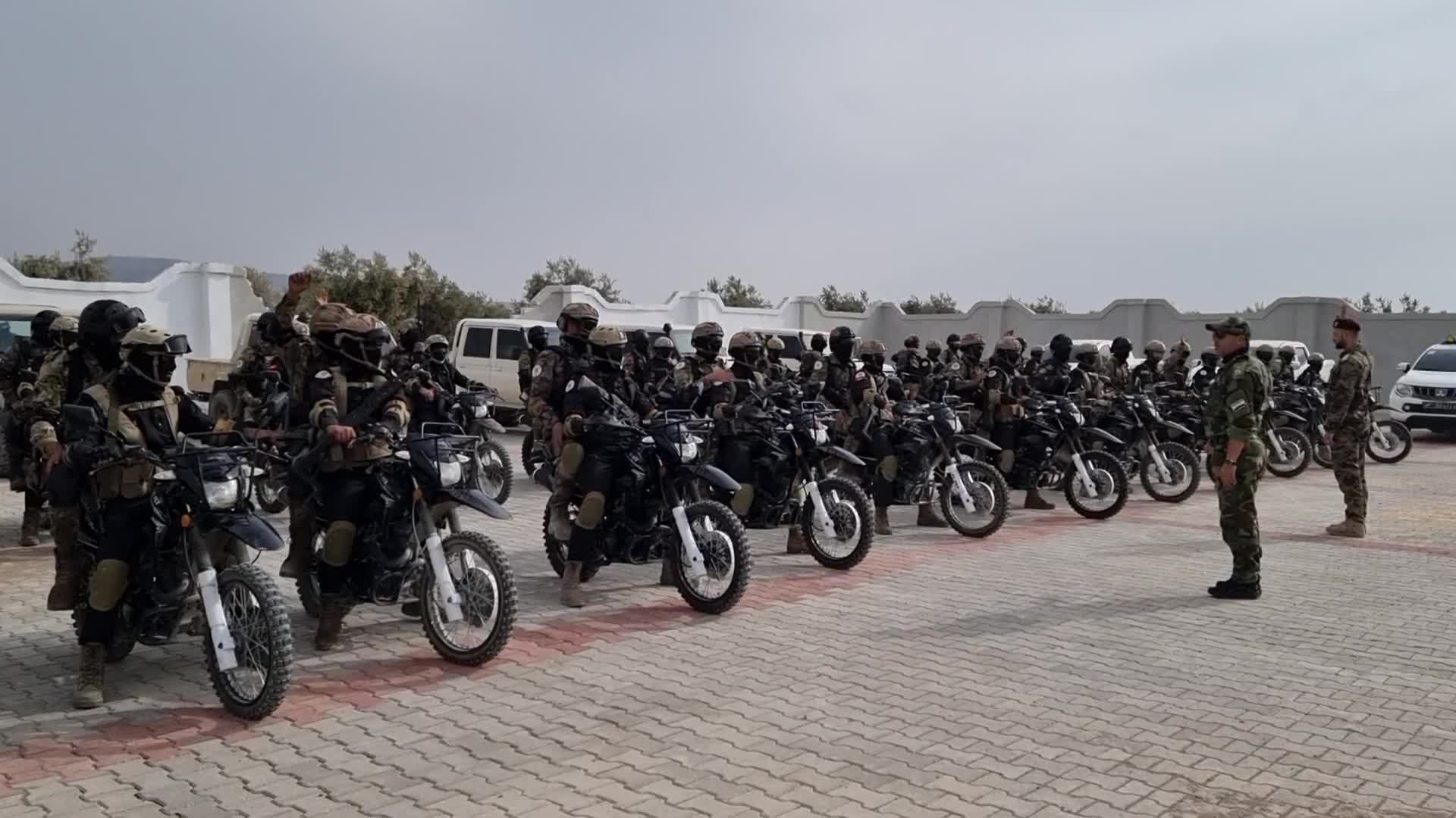 Turkish-backed Syrian rebel fighters take part in a military exercise