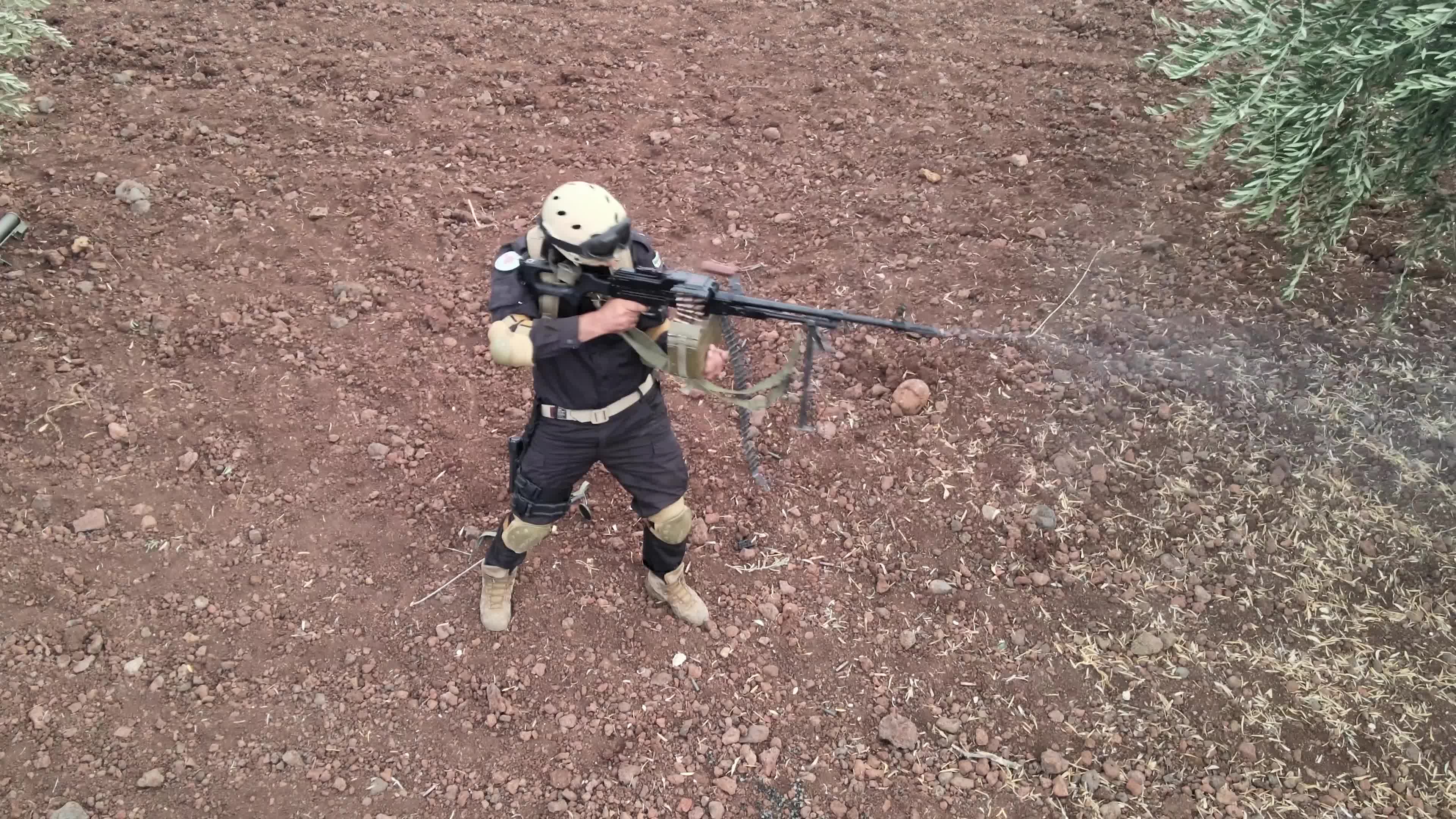 Turkish-backed Syrian rebel fighters take part in a military exercise