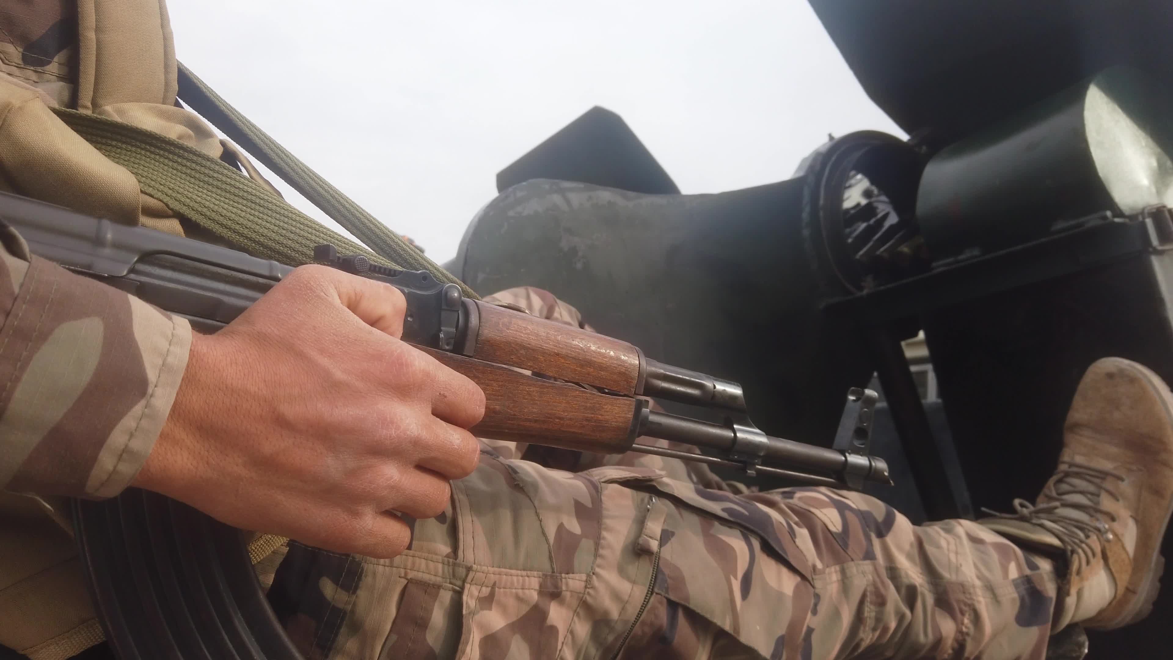 Turkish-backed Syrian rebel fighters take part in a military exercise