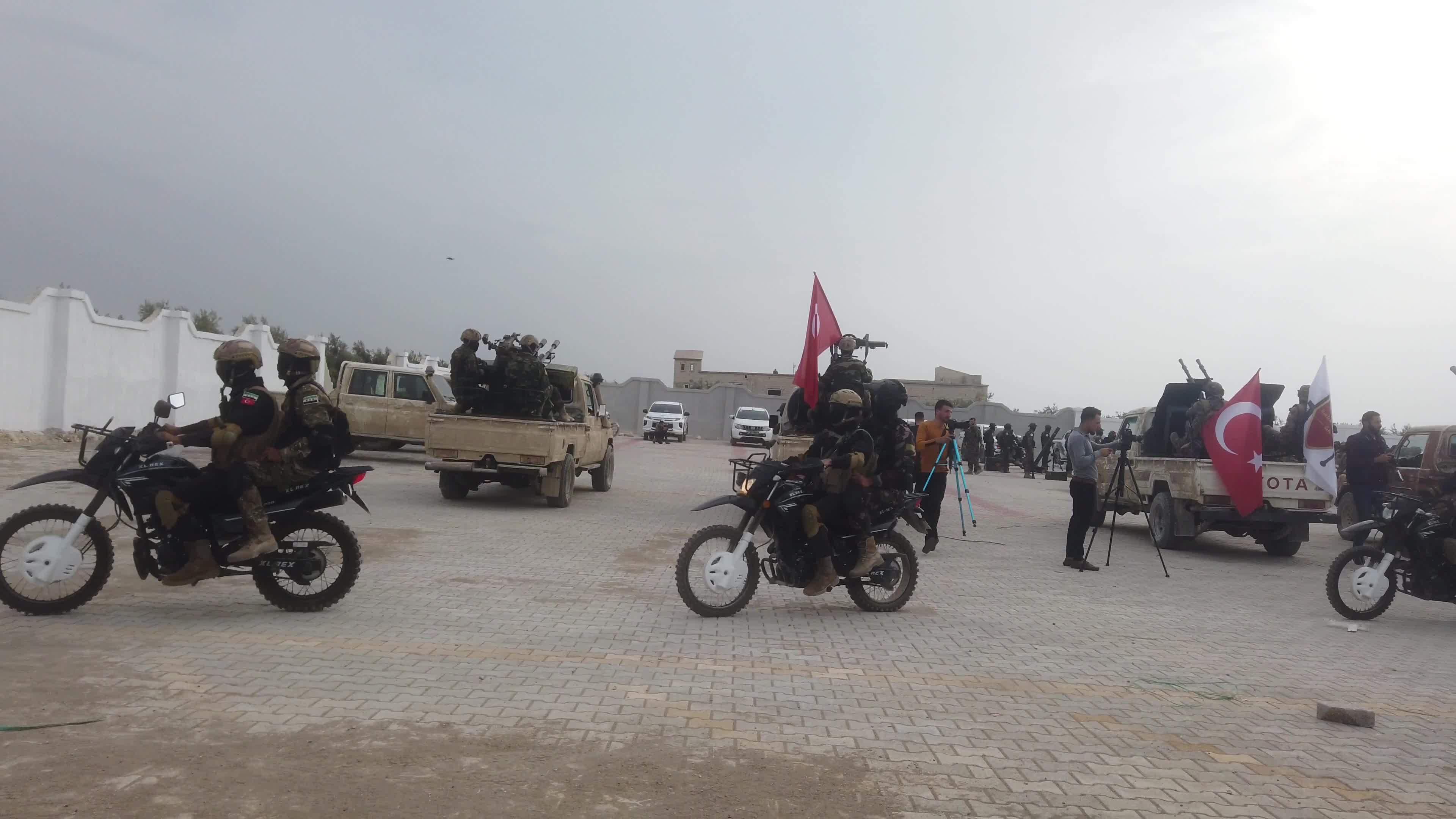 Turkish-backed Syrian rebel fighters take part in a military exercise