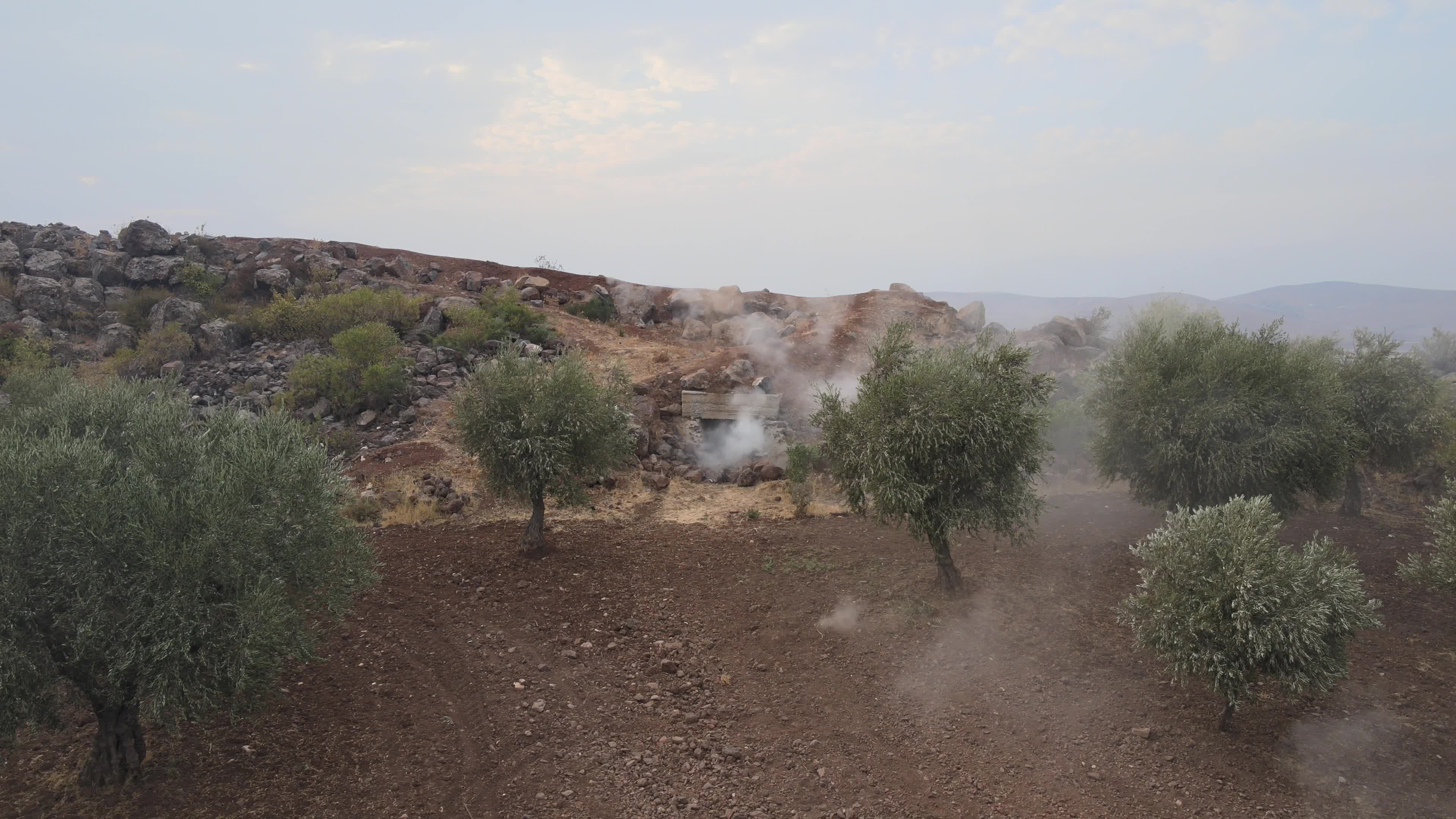 Turkish-backed Syrian rebel fighters take part in a military exercise