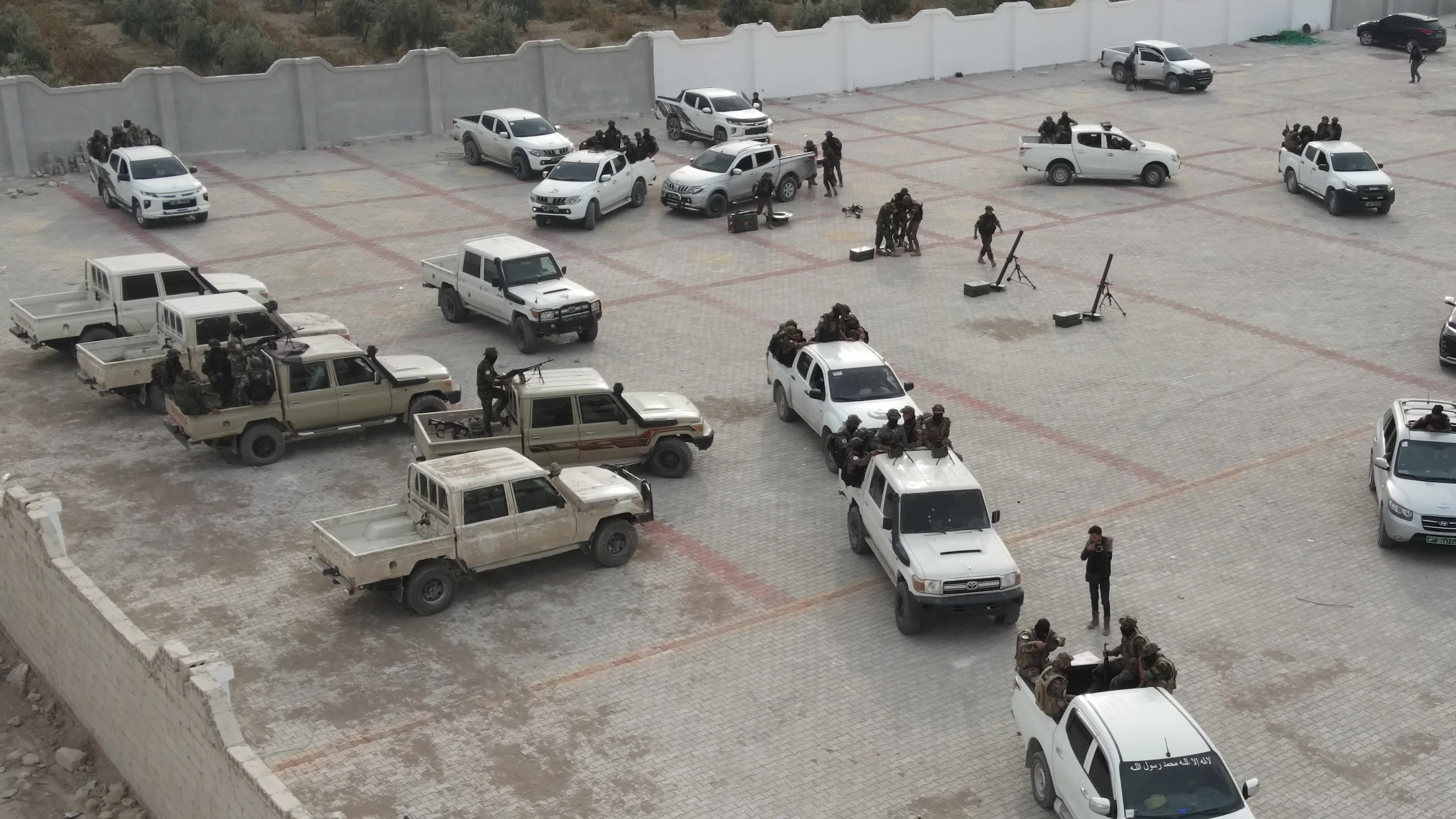 Turkish-backed Syrian rebel fighters take part in a military exercise