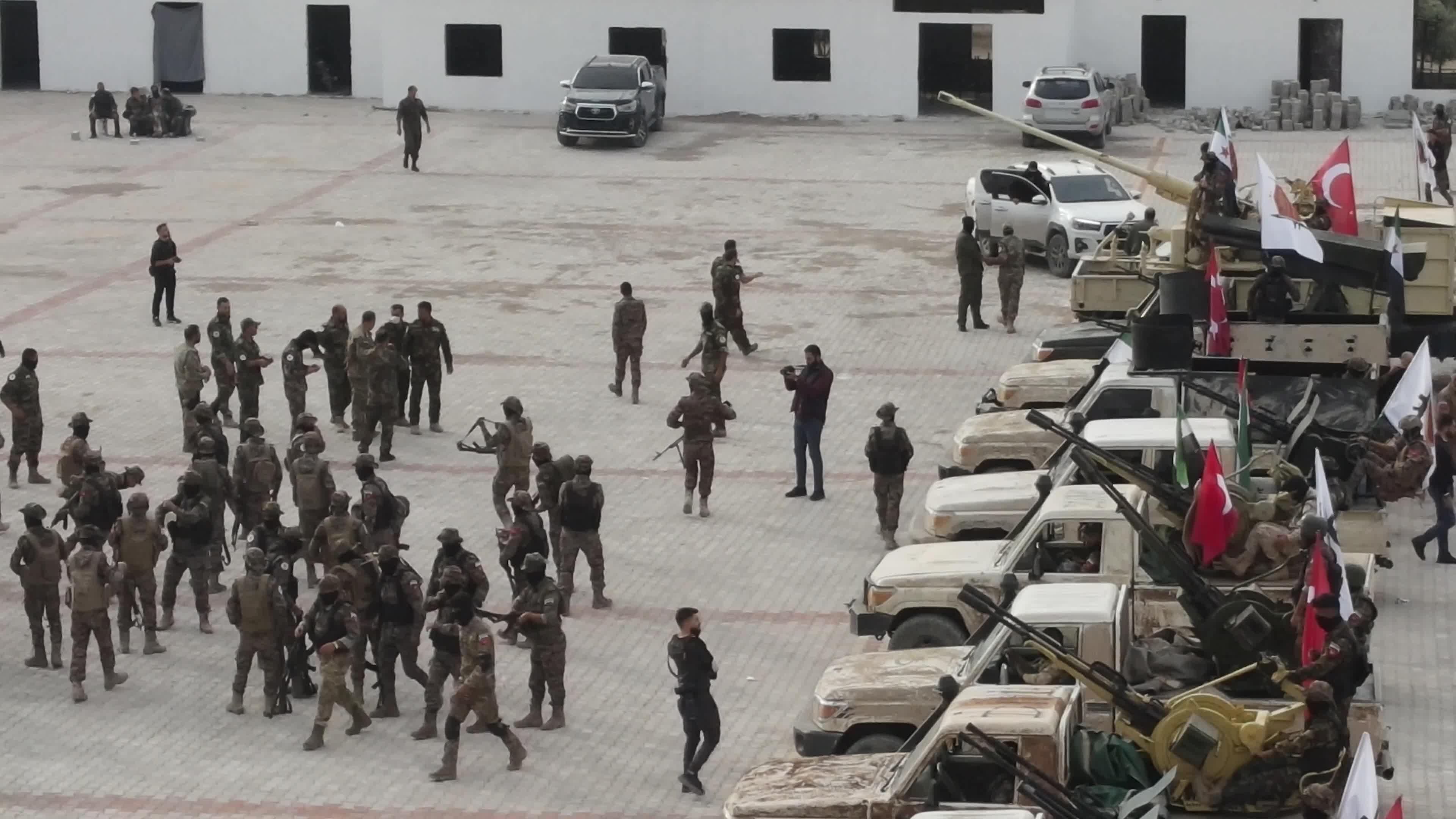 Turkish-backed Syrian rebel fighters take part in a military exercise