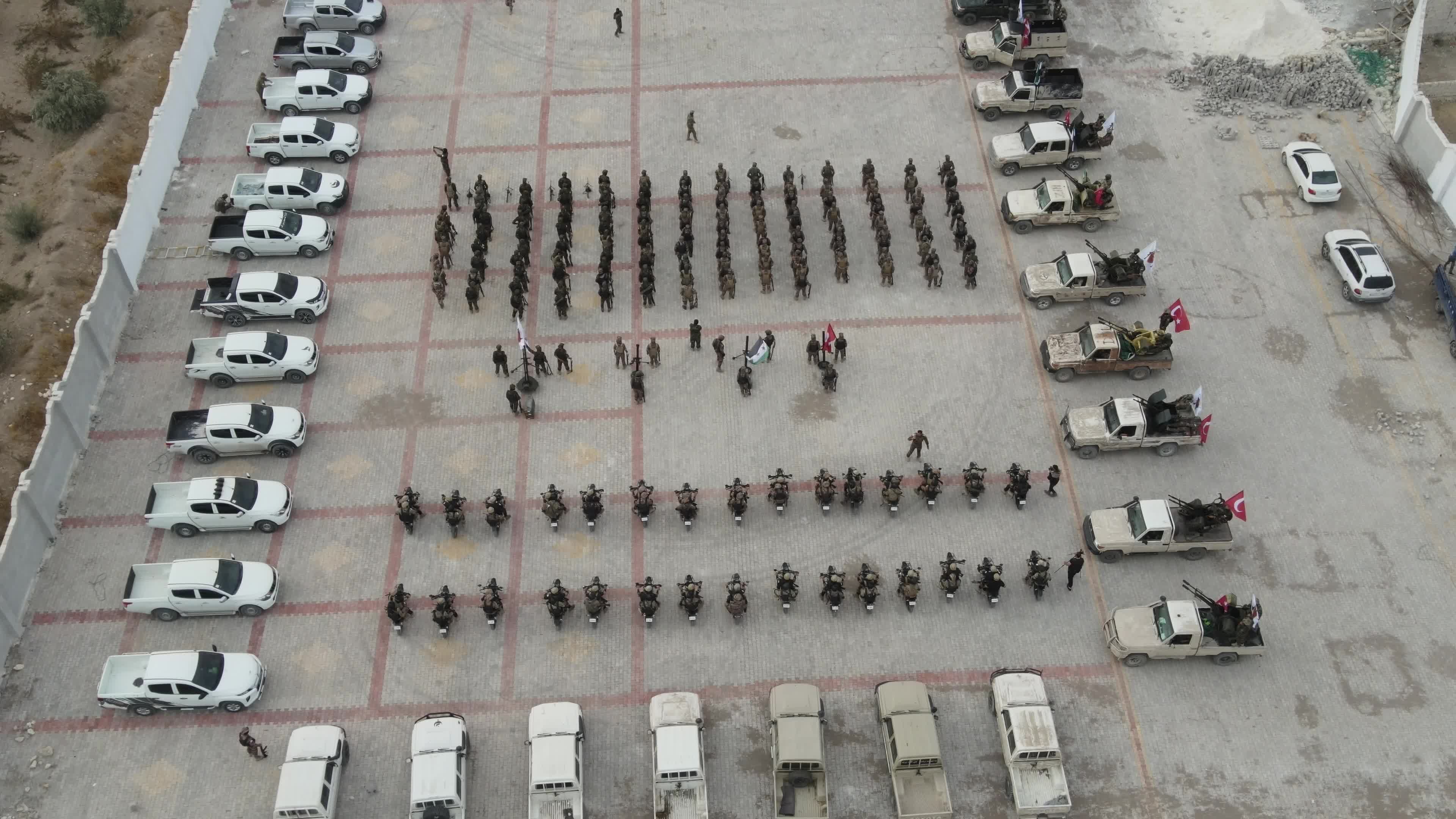 Turkish-backed Syrian rebel fighters take part in a military exercise