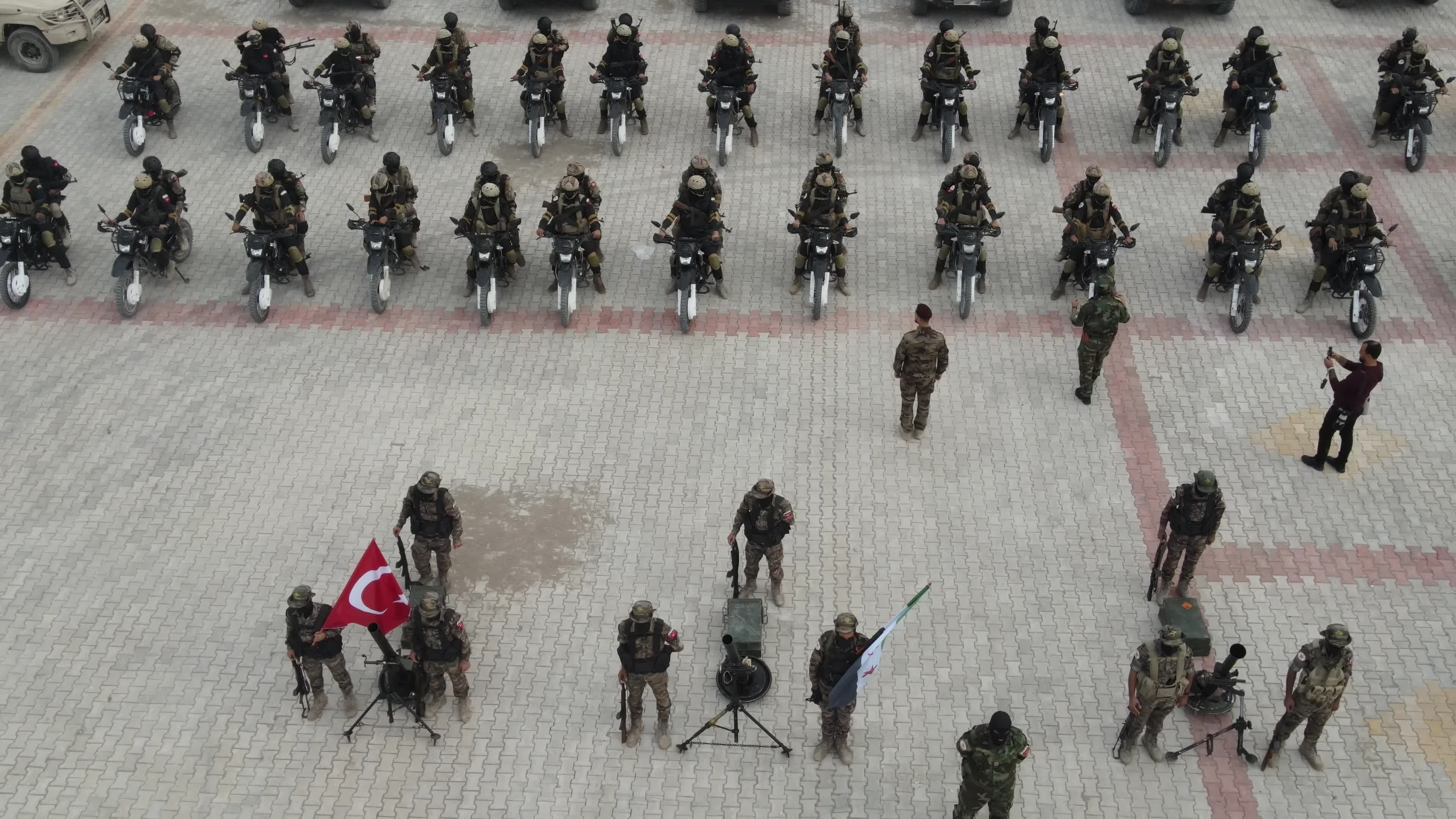 Turkish-backed Syrian rebel fighters take part in a military exercise