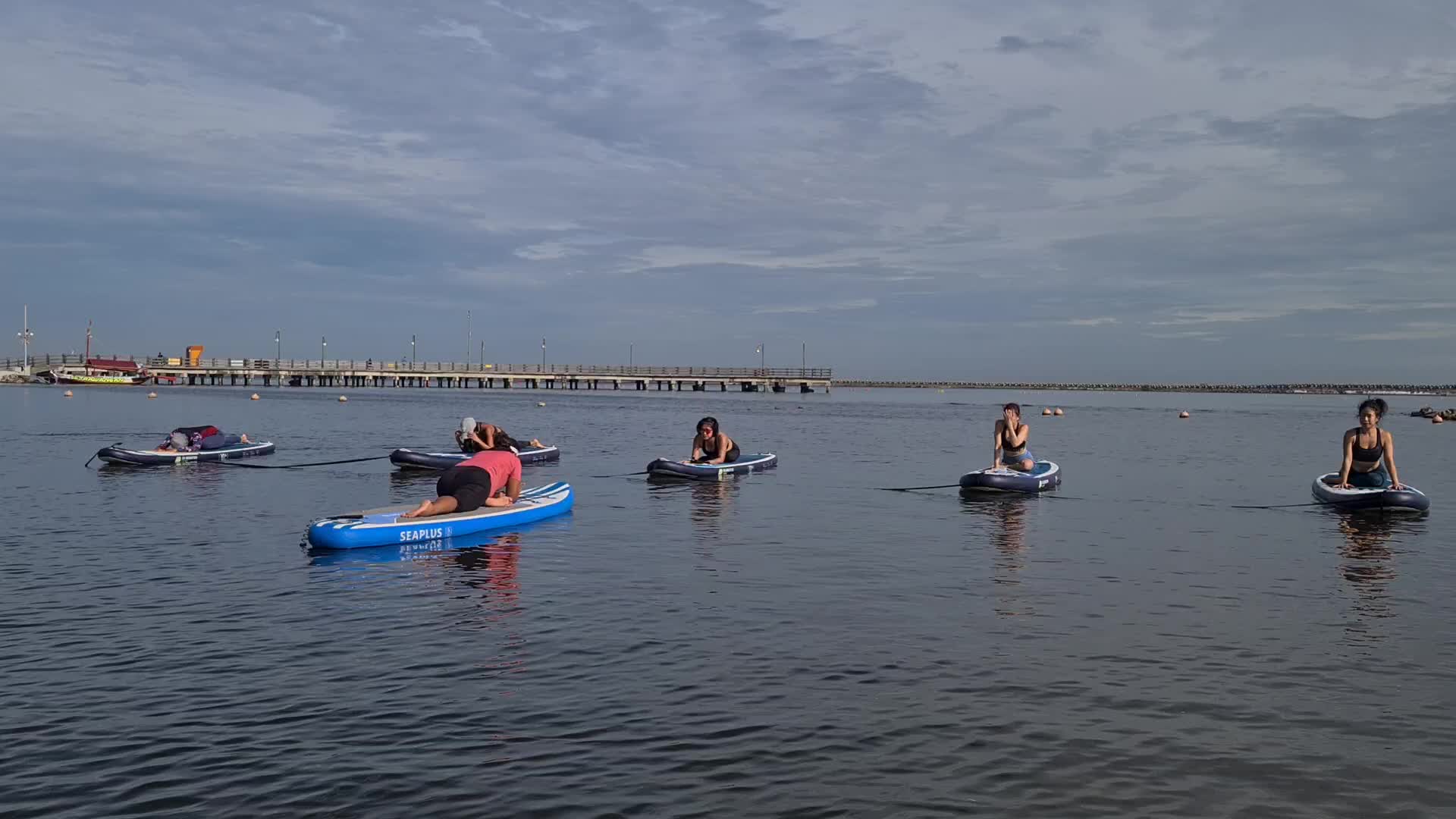 Paddle board yoga in Jakarta during the pandemic