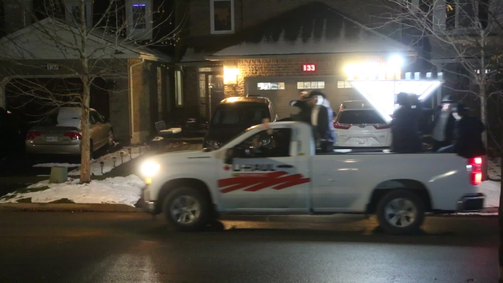 Car top menorah parade during the Jewish holiday of Hanukkah