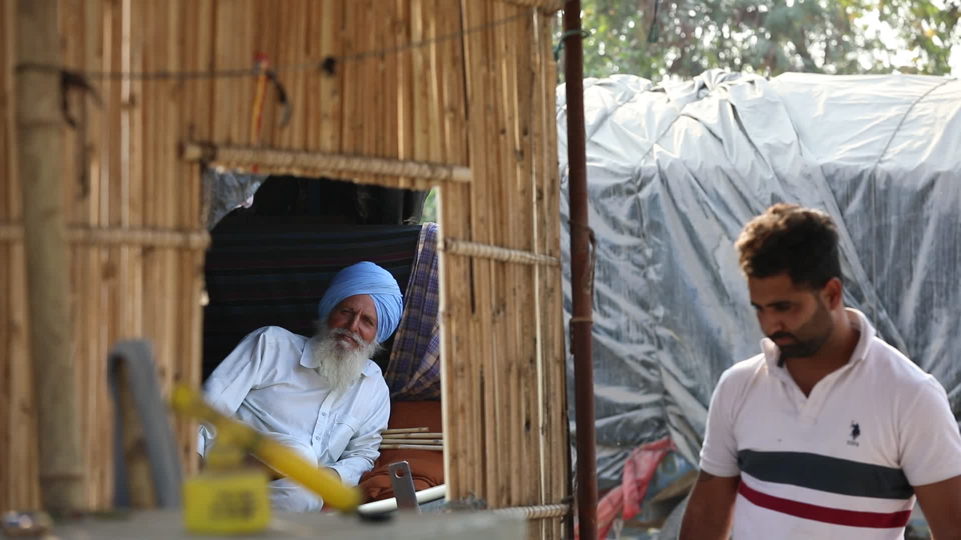 Indian farmers end year long protests and return home after government accepts demands