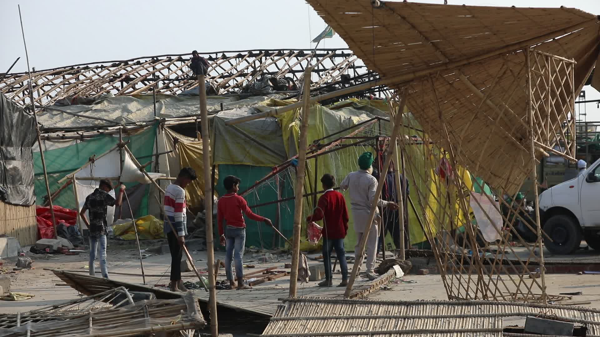 Indian farmers end year long protests and return home after government accepts demands