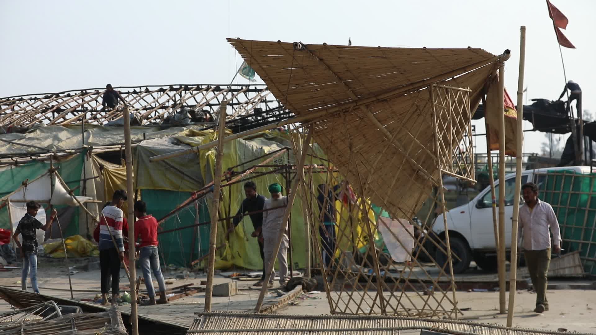 Indian farmers end year long protests and return home after government accepts demands