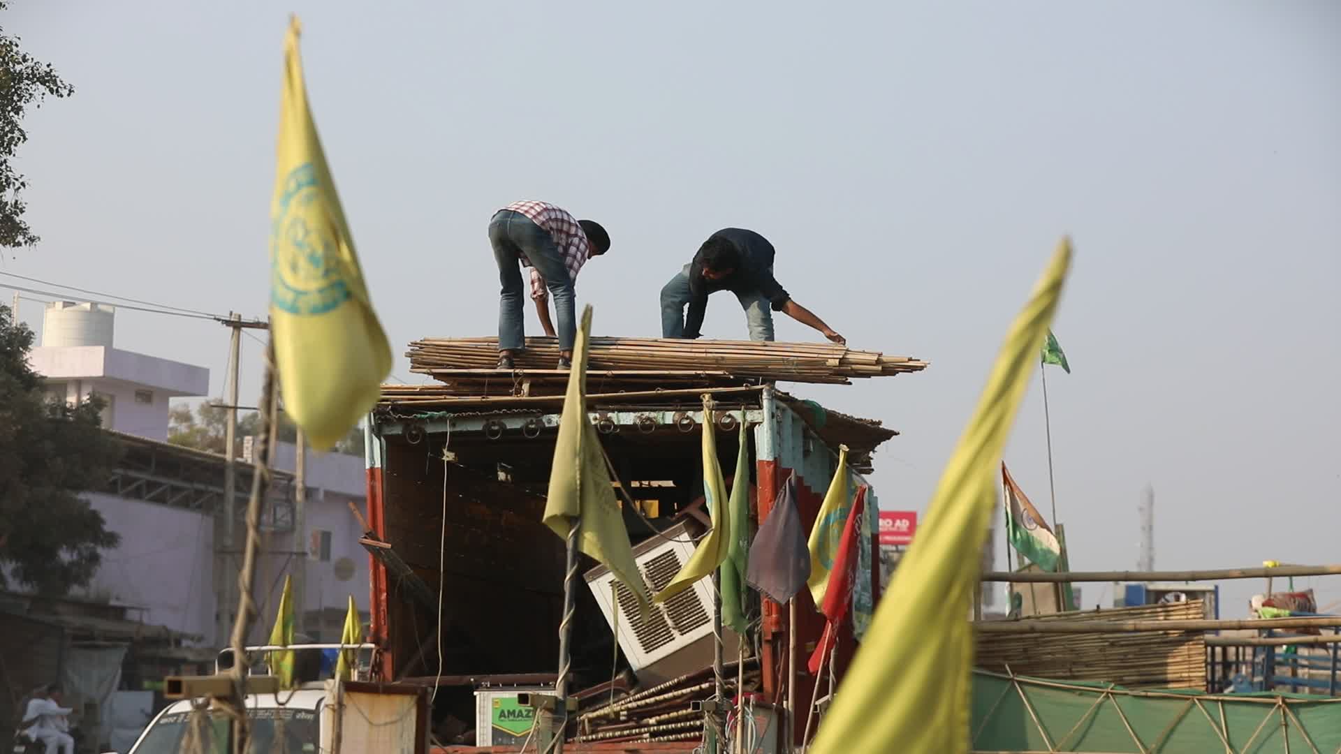 Indian farmers end year long protests and return home after government accepts demands