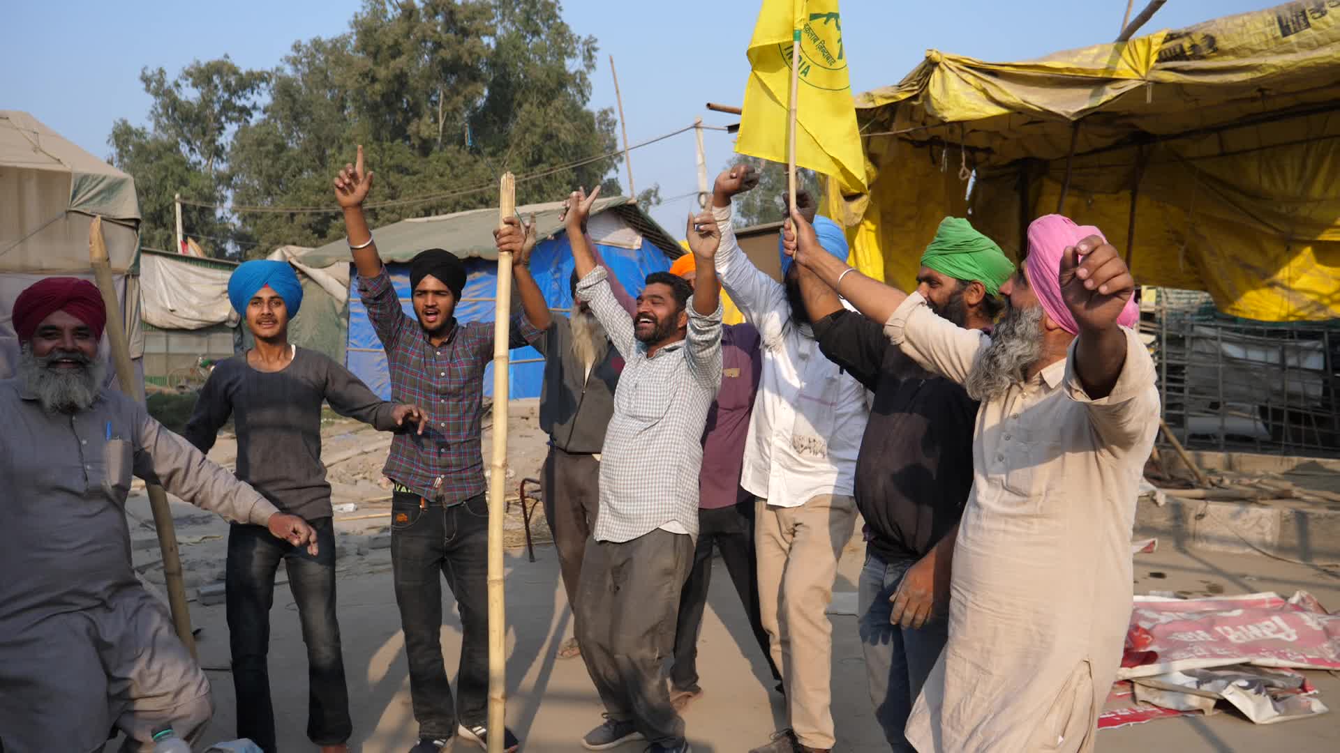Indian farmers end year long protests and return home after government accepts demands