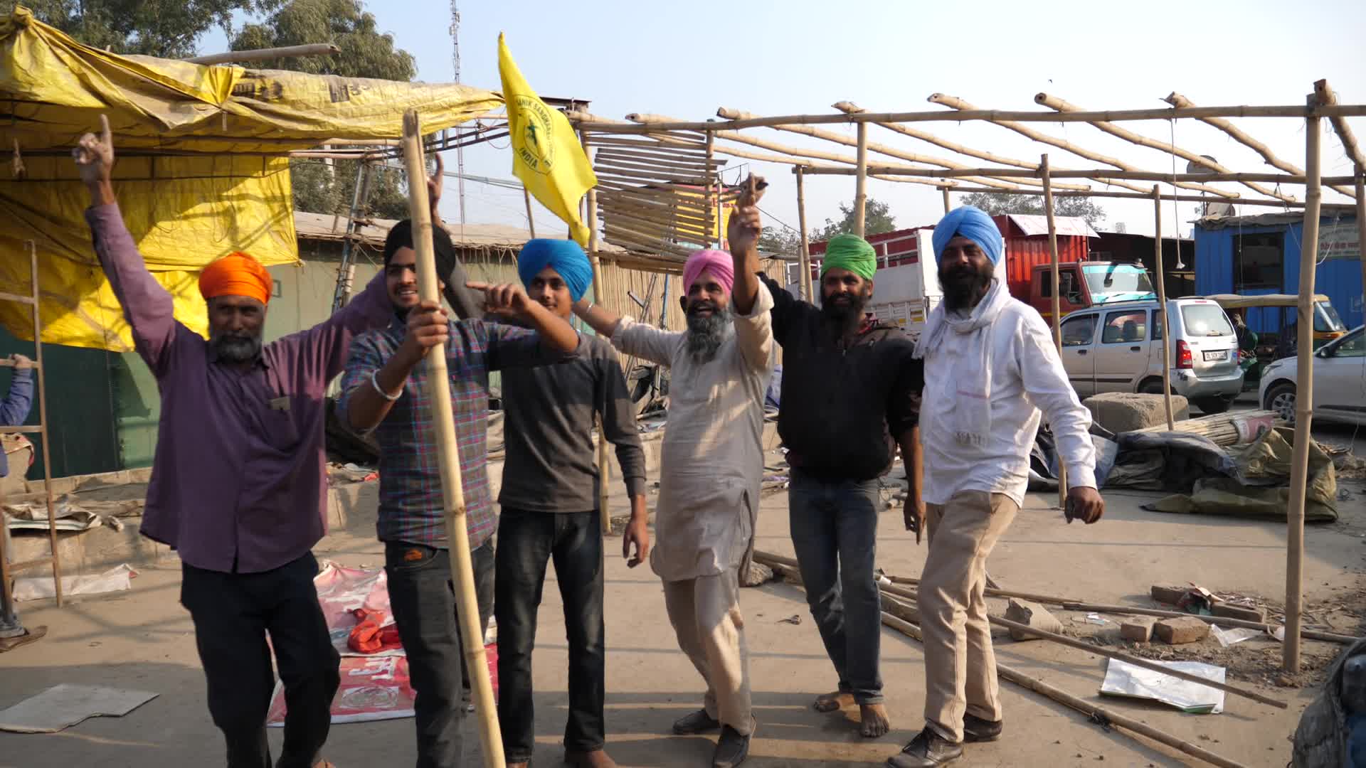 Indian farmers end year long protests and return home after government accepts demands