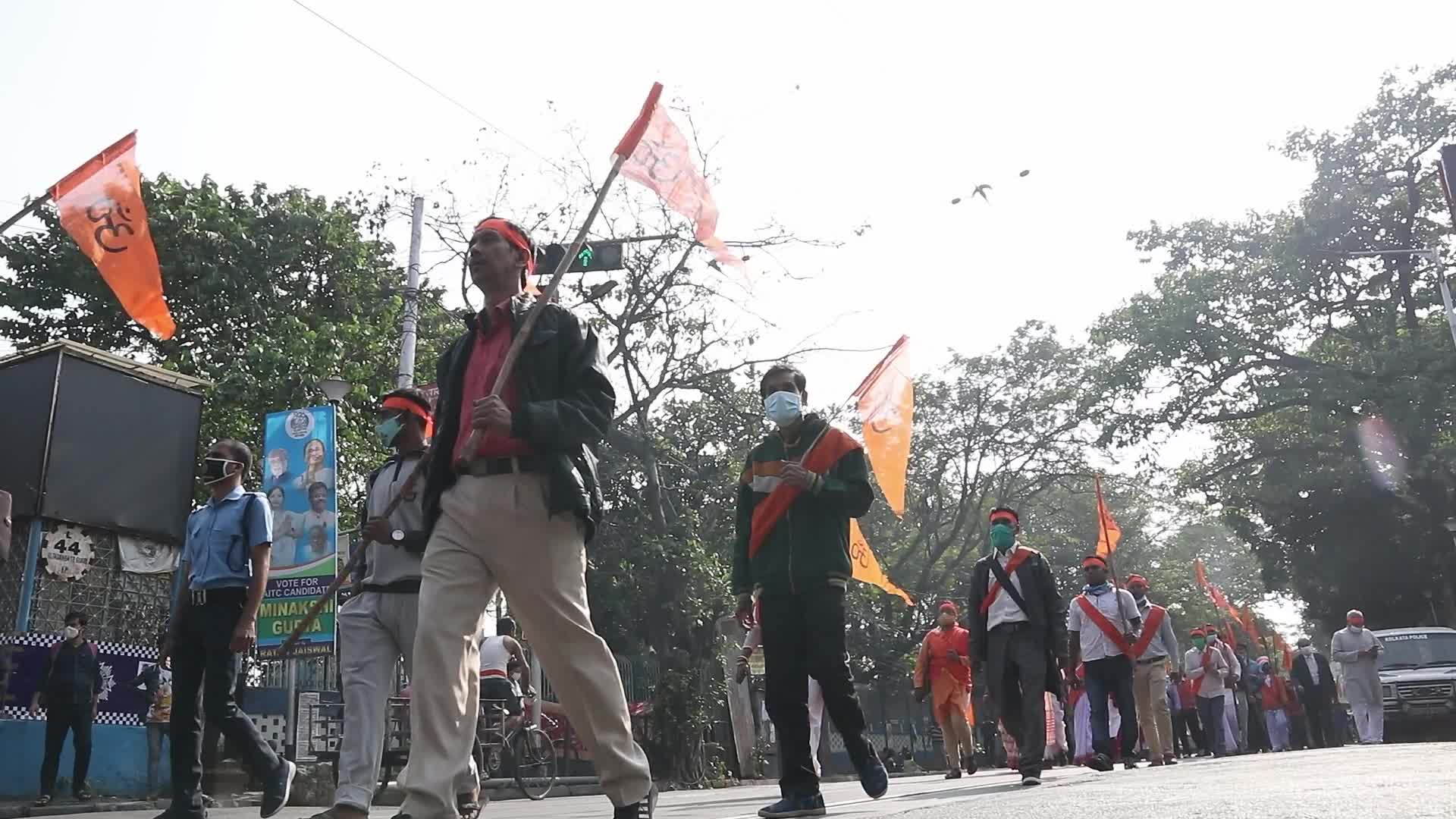 Vishwa Hindu Parishad and Bajrang Dal activists take part in a rally in Kolkata