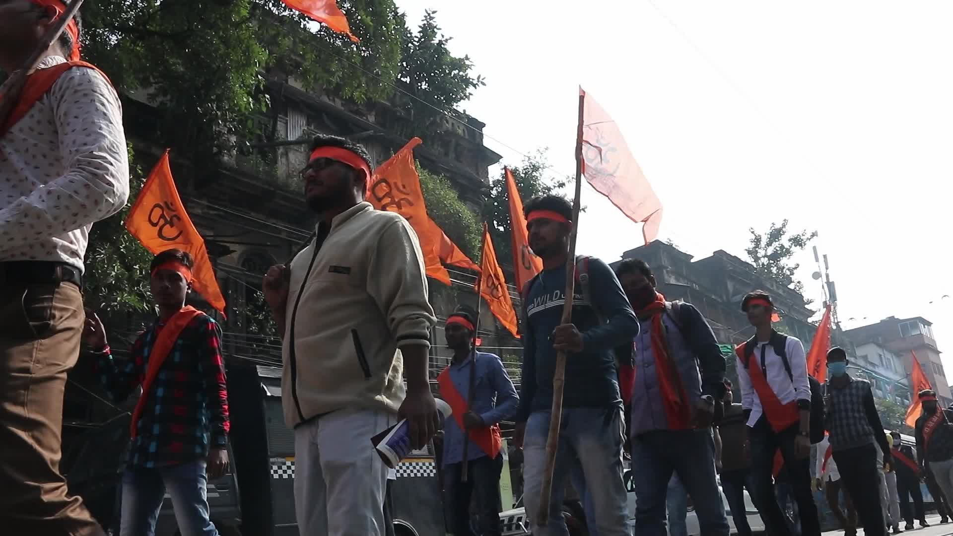 Vishwa Hindu Parishad and Bajrang Dal activists take part in a rally in Kolkata