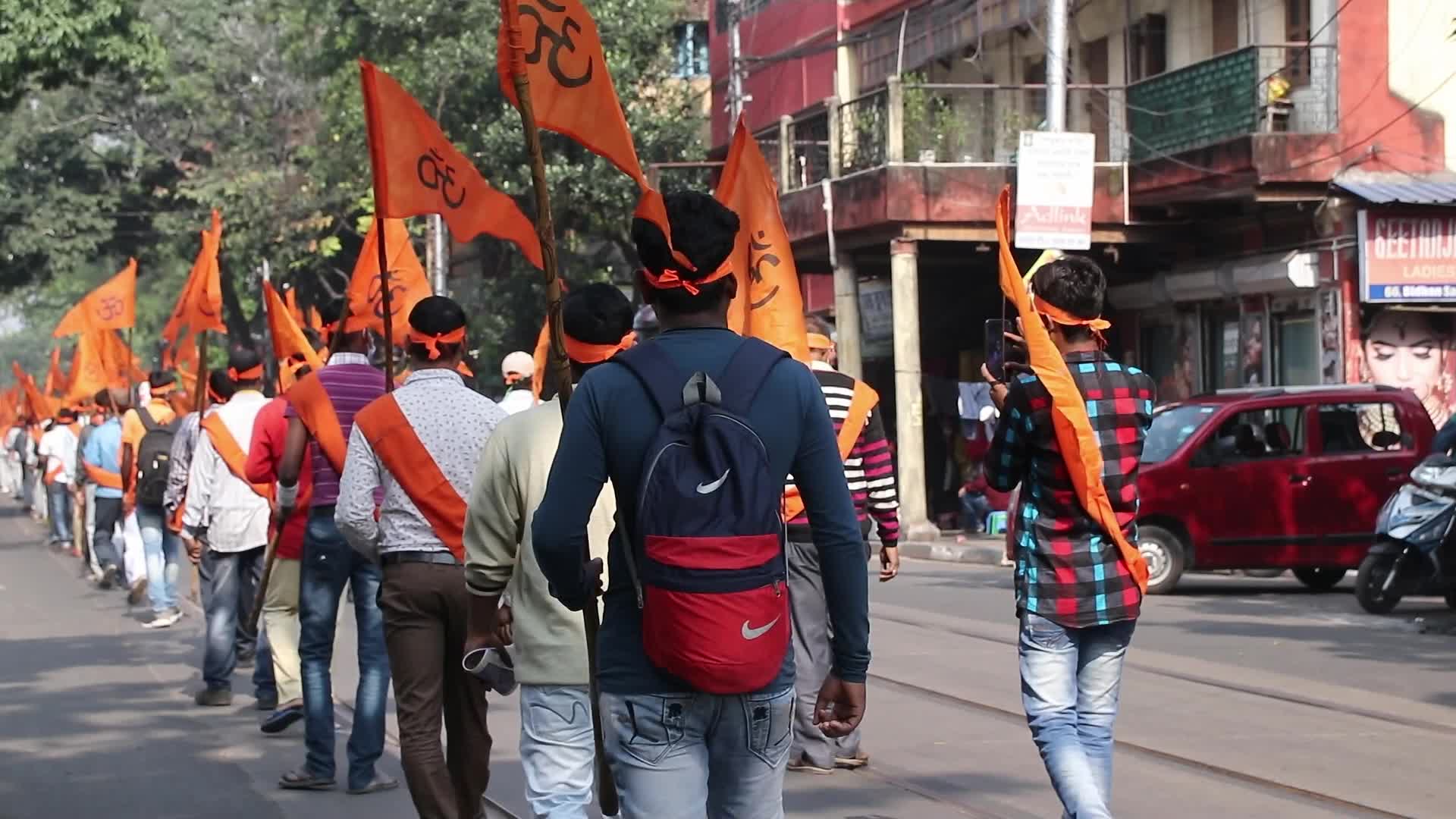 Vishwa Hindu Parishad and Bajrang Dal activists take part in a rally in Kolkata