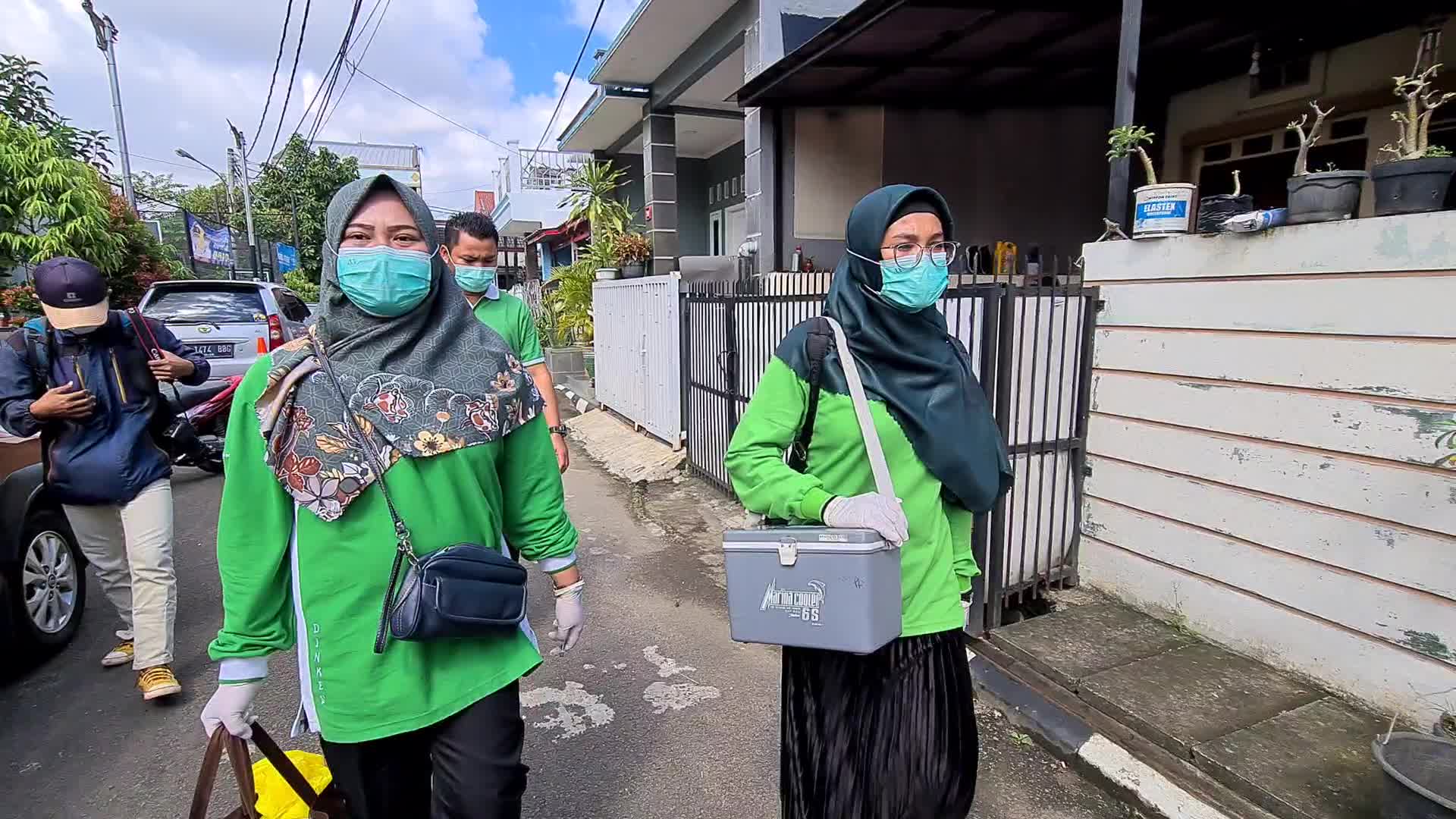 Door-to-Door COVID-19 Vaccine Campaign In Indonesia