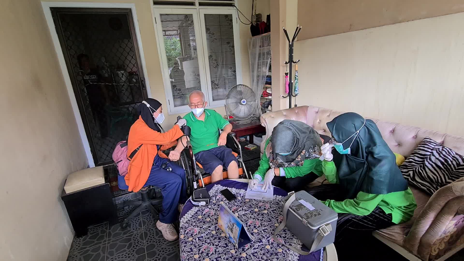 Door-to-Door COVID-19 Vaccine Campaign In Indonesia