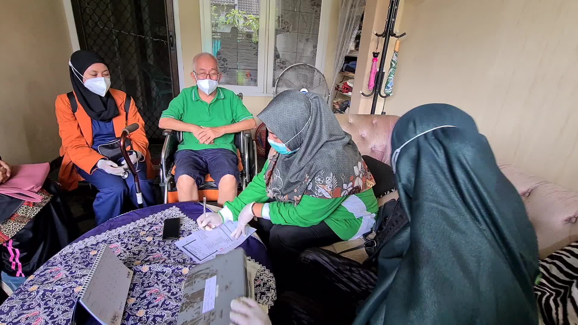 Door-to-Door COVID-19 Vaccine Campaign In Indonesia
