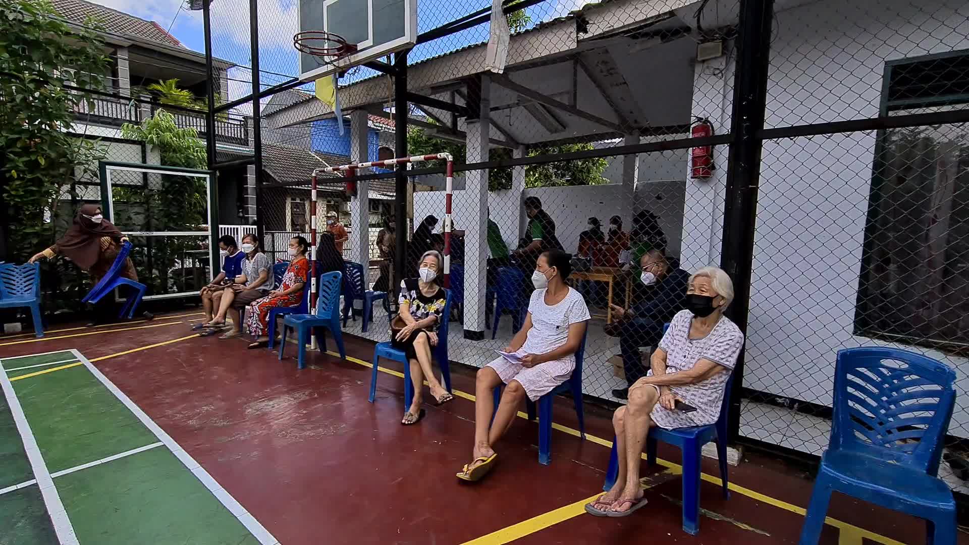 Door-to-Door COVID-19 Vaccine Campaign In Indonesia