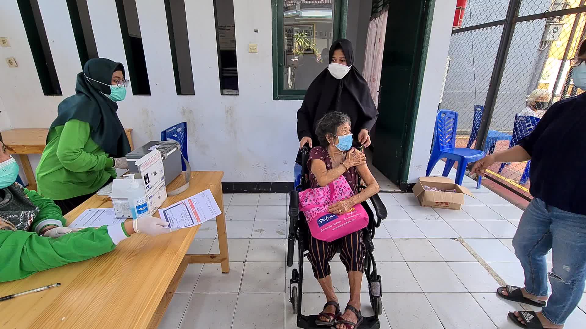 Door-to-Door COVID-19 Vaccine Campaign In Indonesia