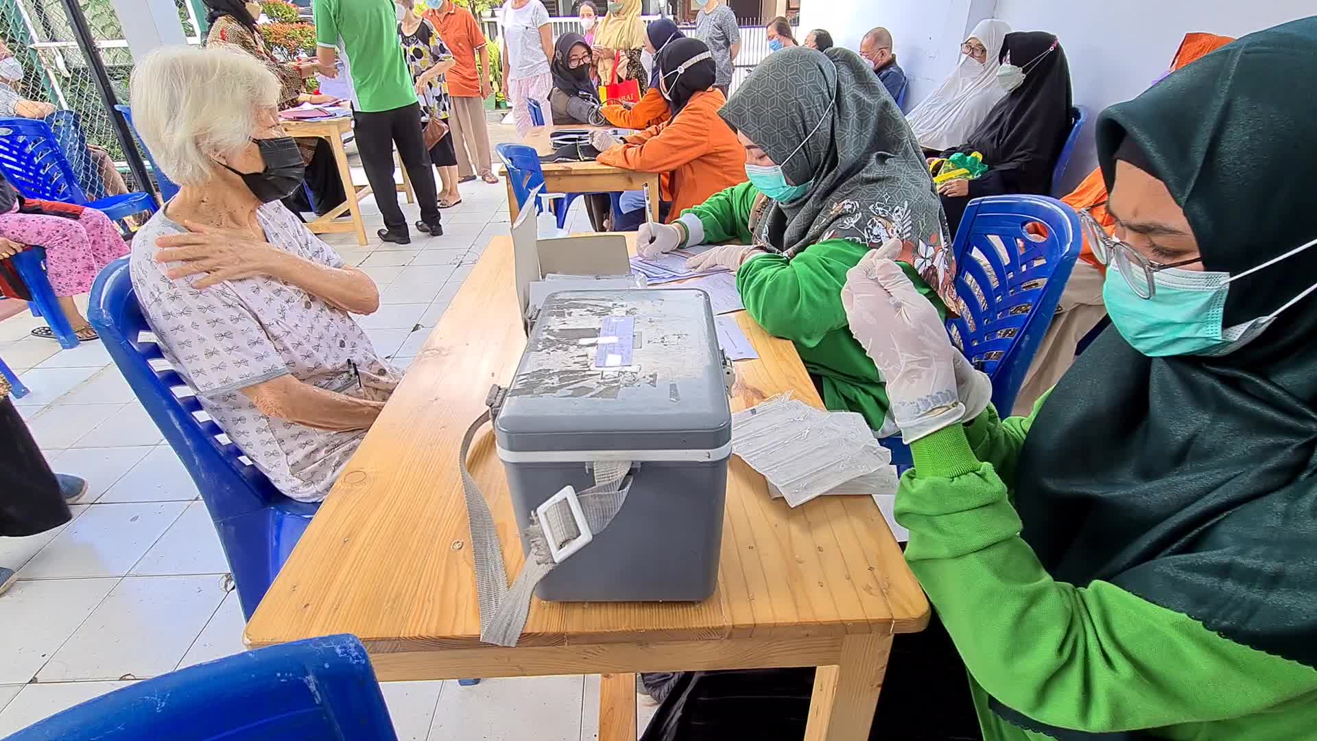 Door-to-Door COVID-19 Vaccine Campaign In Indonesia