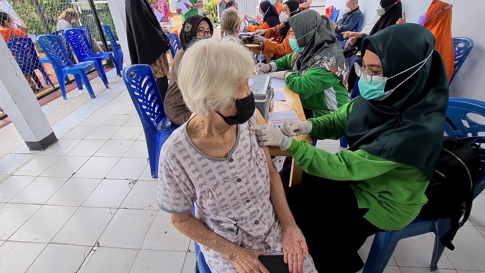 Door-to-Door COVID-19 Vaccine Campaign In Indonesia