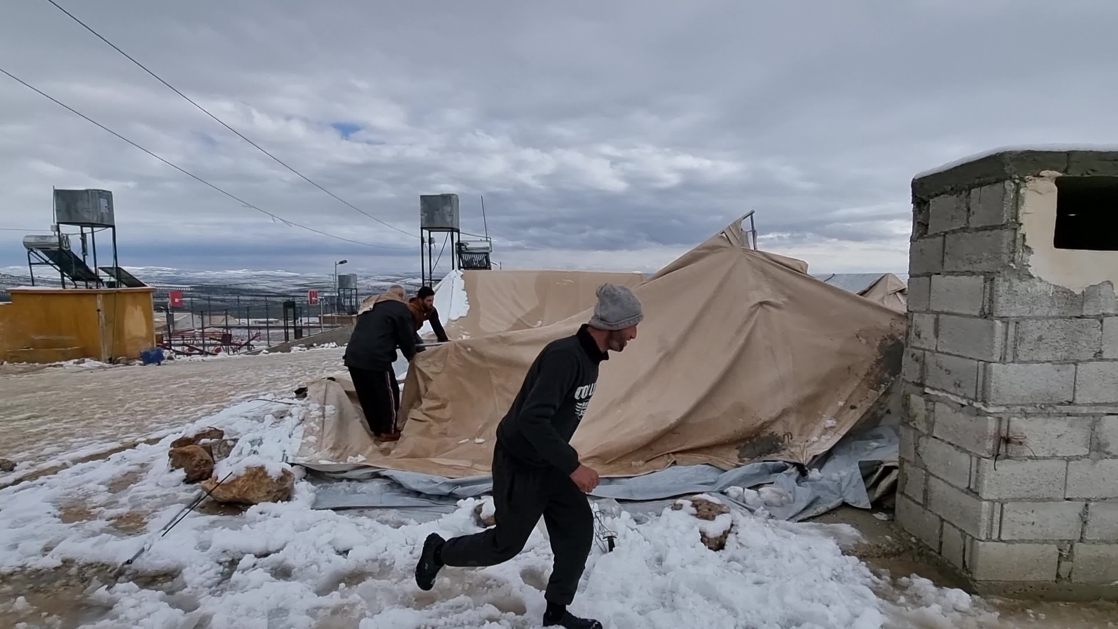 Snow storm hits refugee camps in northern Syria